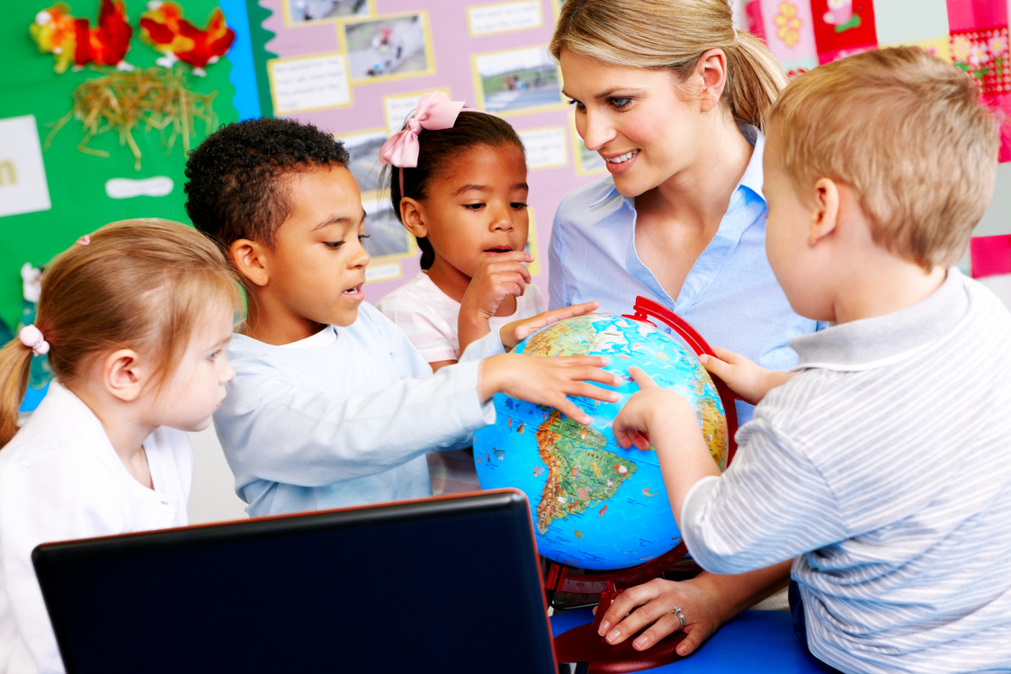 Teacher explaining the world to students